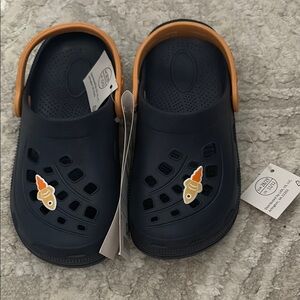 Blue croc-like shoes